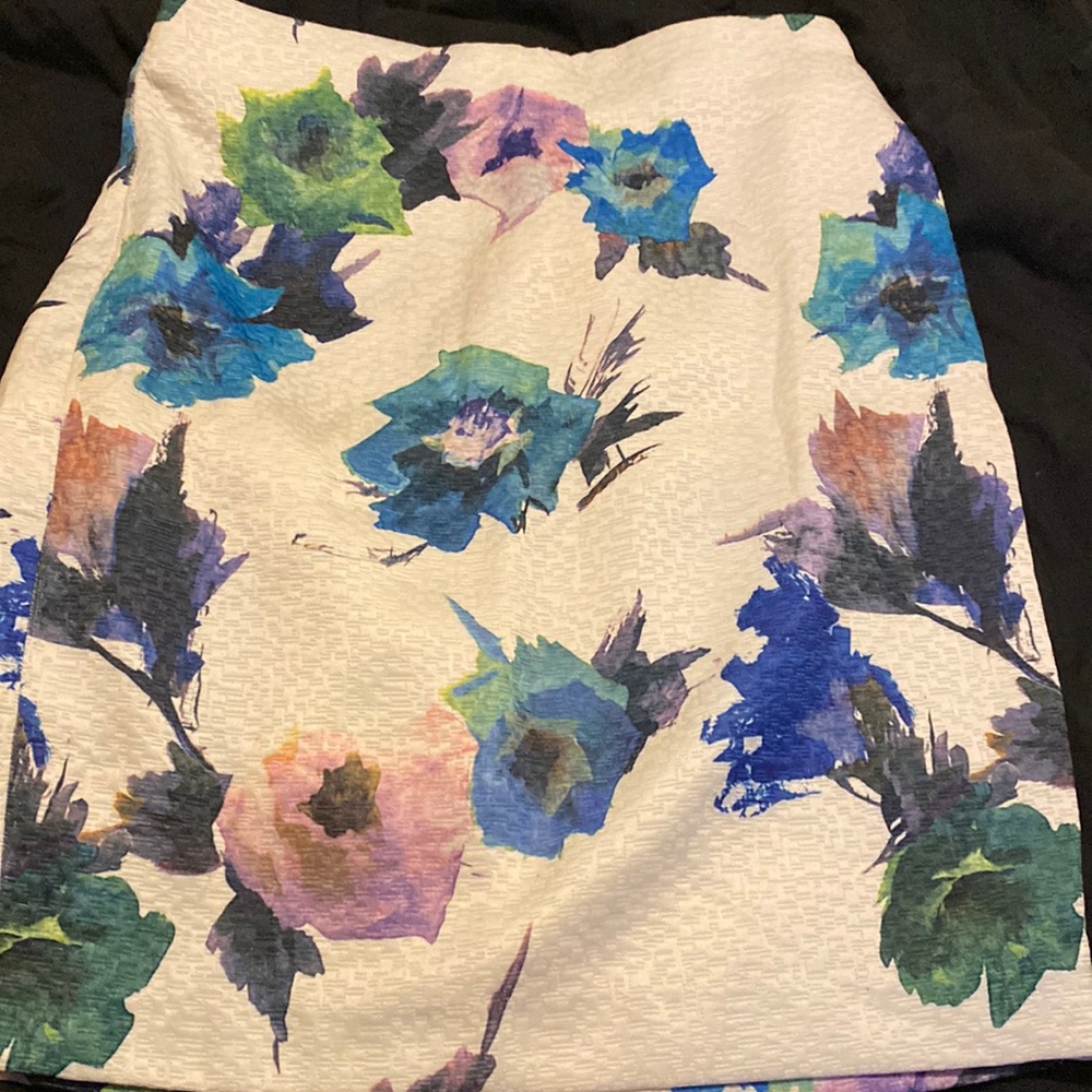 The skirt beautiful colors and the length is 22 by 16
